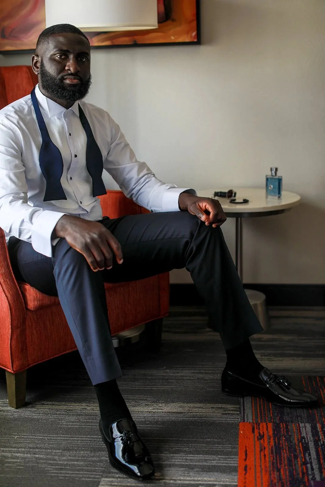 Groom seated before the wedding
